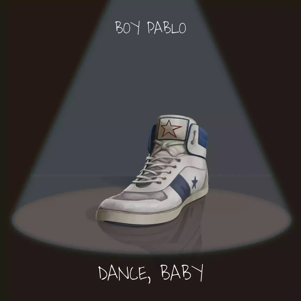 A shoe under a spotlight.